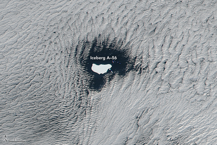 Low stratus clouds framing iceberg A-56 drifted in the South Atlantic Ocean. Stratus